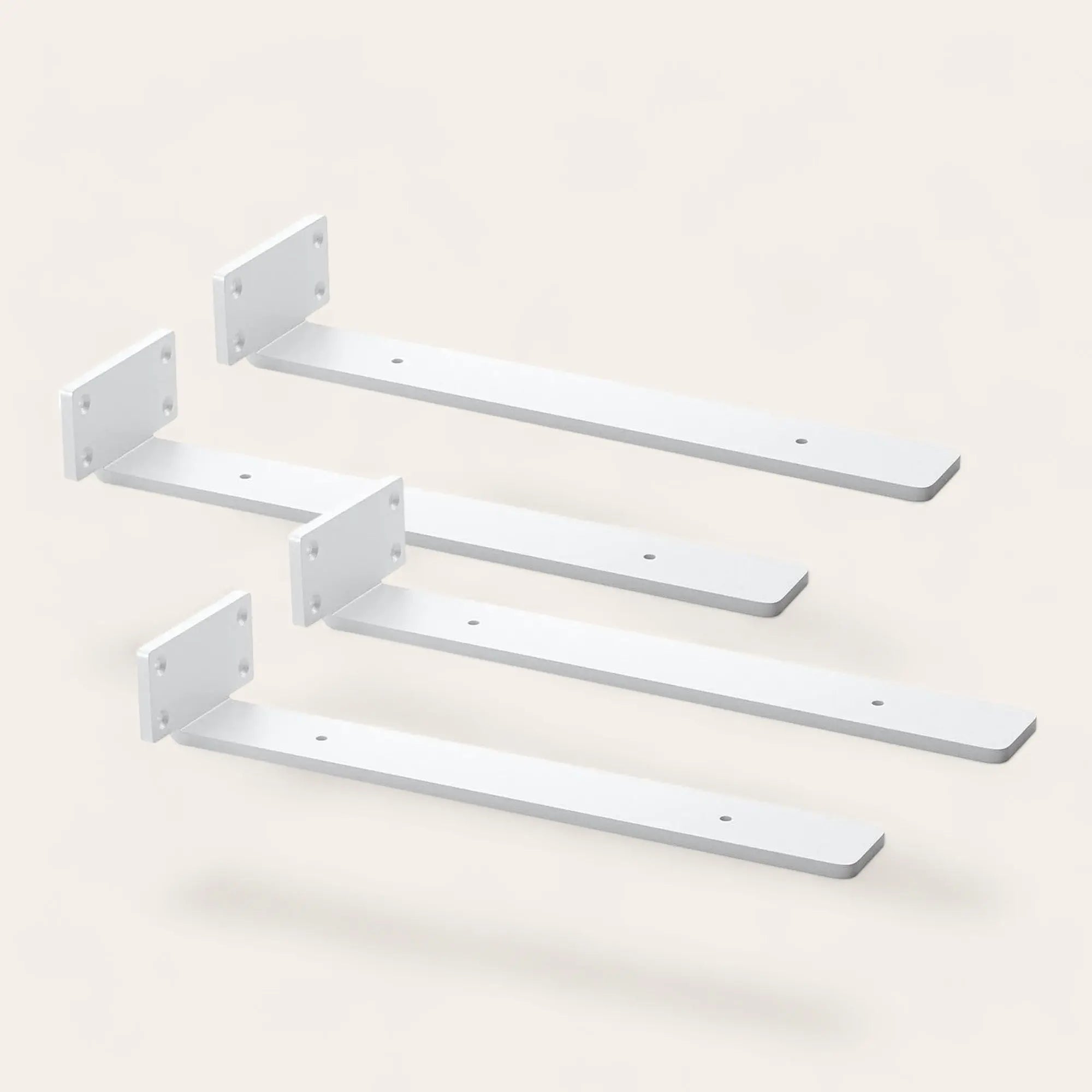 Supports blancs à bras plats de différentes longueurs présentés ensemble